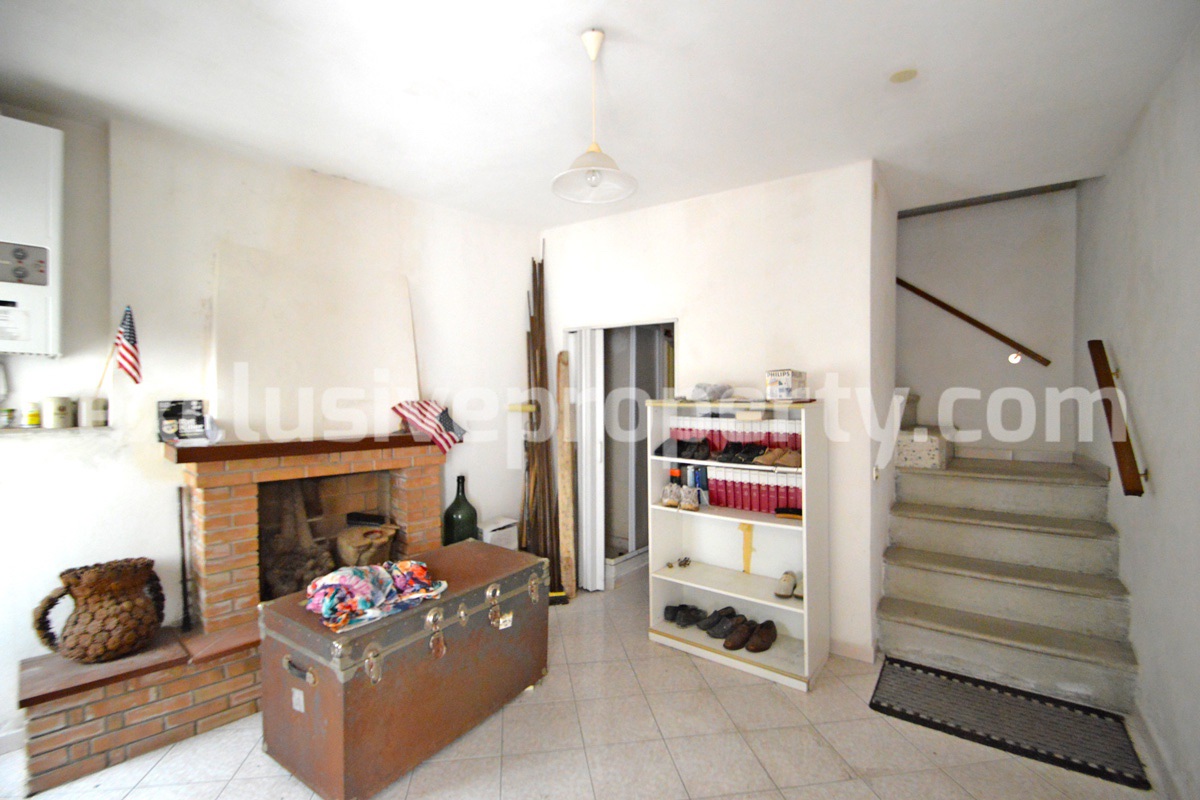 Ancient stone house with marble door for sale in Abruzzo
