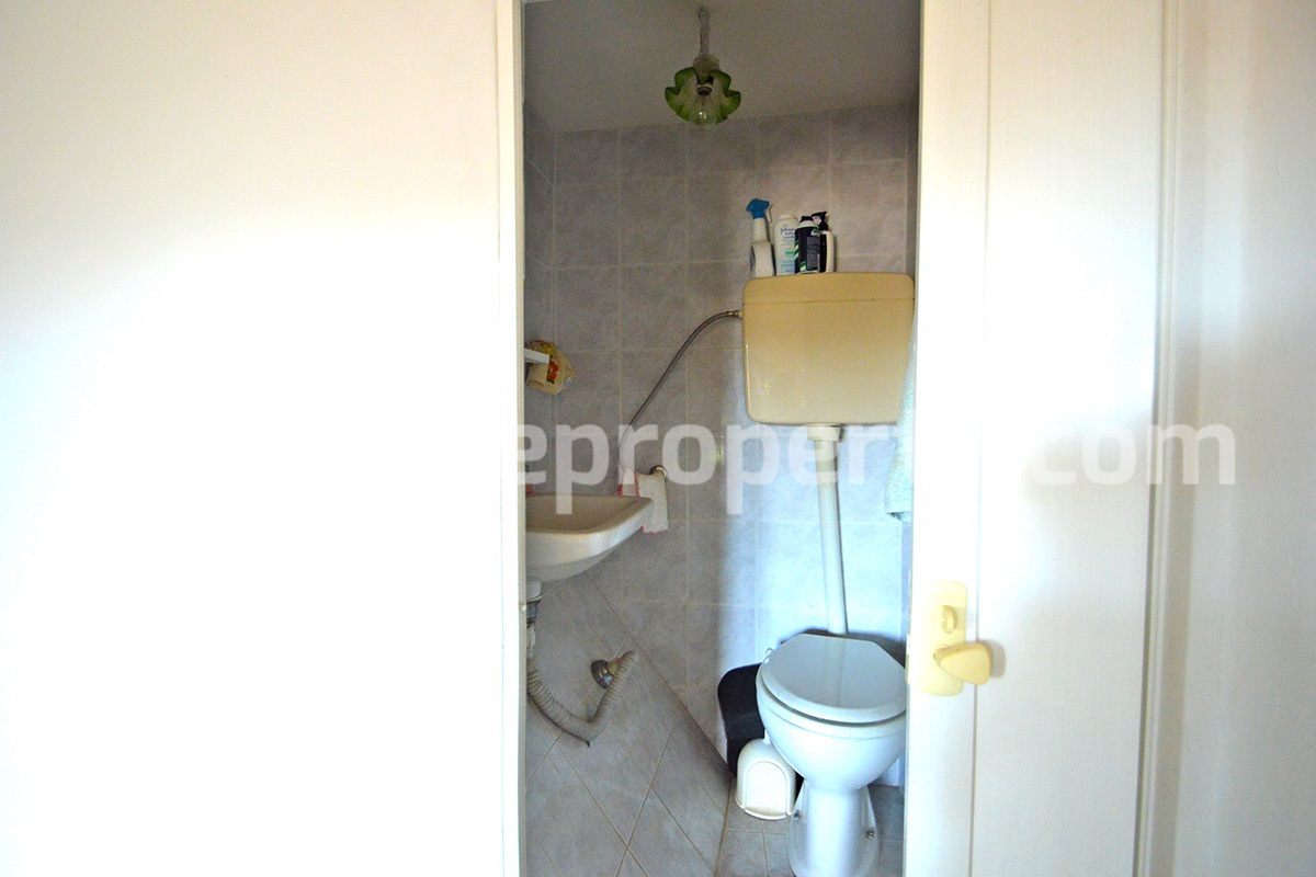 Ancient stone house with marble door for sale in Abruzzo