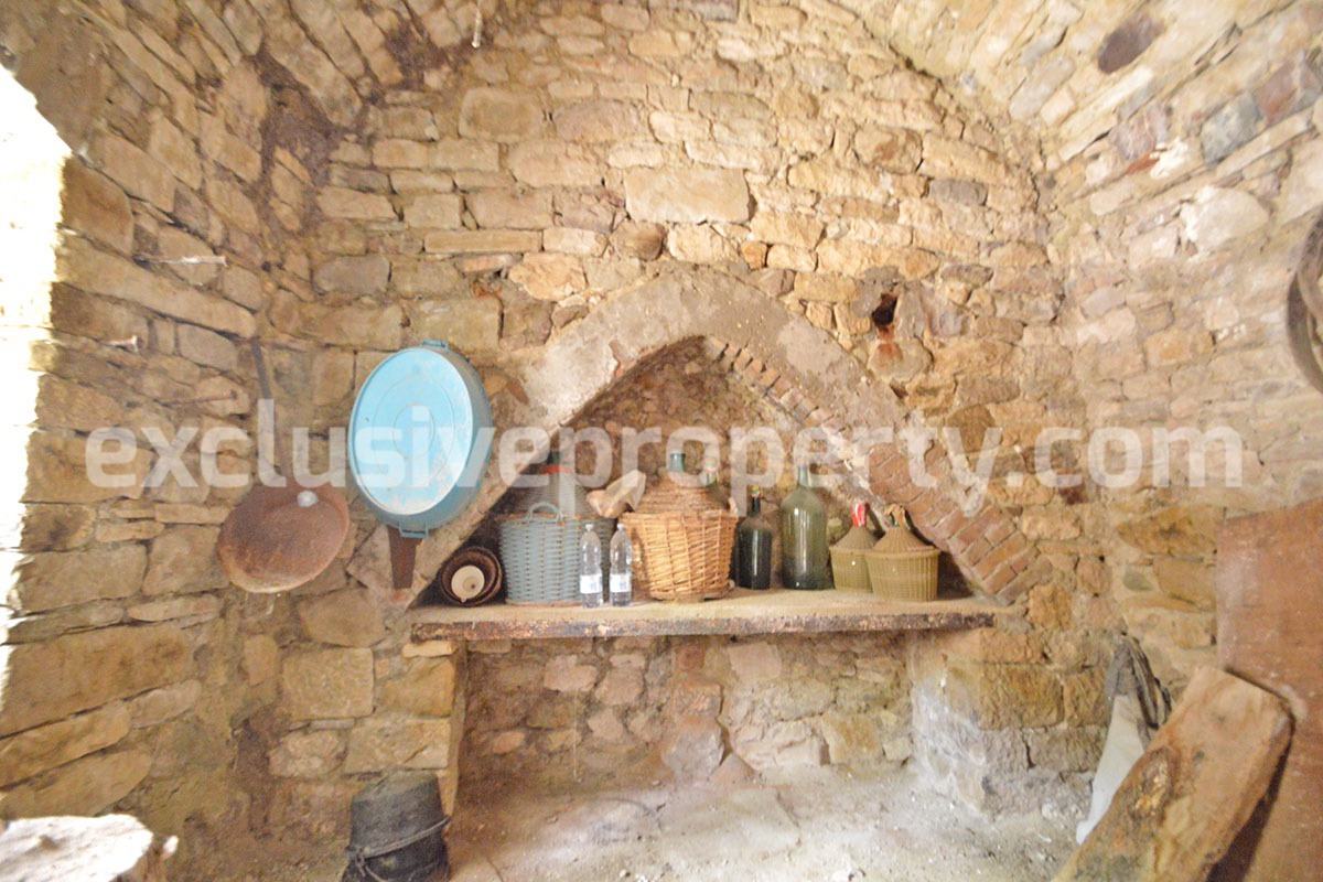Ancient stone house with garden and olive trees for sale in Molise 13