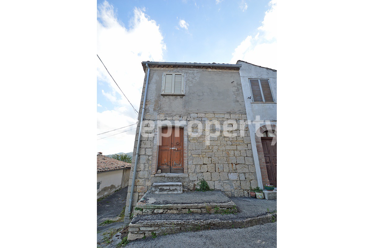 Stone ancient village house with new roof for sale in Italy 2