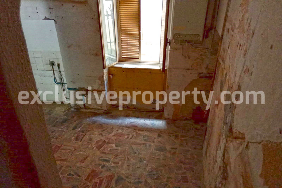 Low priced brick house with landscaped hills and sea for sale in Abruzzo 12
