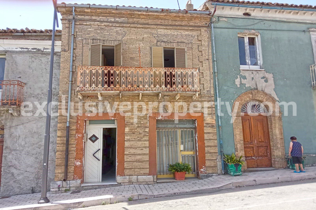 Low priced brick house with landscaped hills and sea for sale in Abruzzo 1