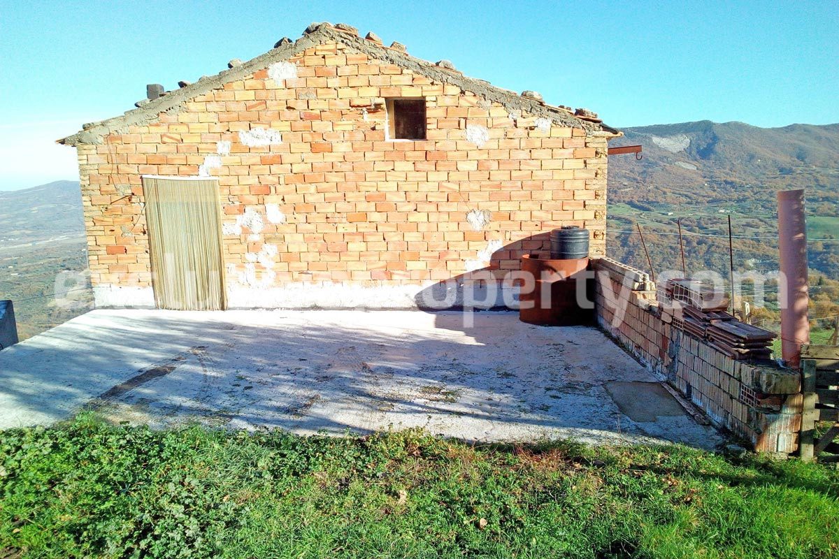 Brick farmhouse surrounded by nature with well for sale in Italy 3