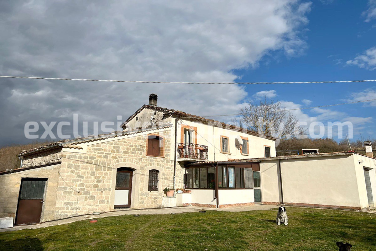 Home built in stone with land fenced and well in a private but not isolated position 1