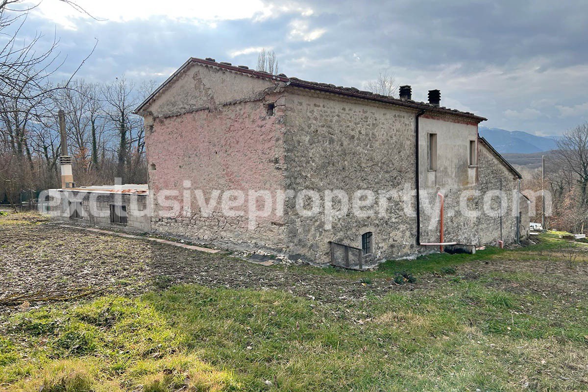 Home built in stone with land fenced and well in a private but not isolated position 30
